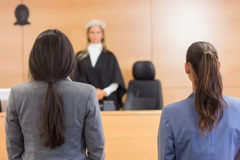 Courtroom scene with judge, lawyer, and accused symbolizing bail bond revocation process.